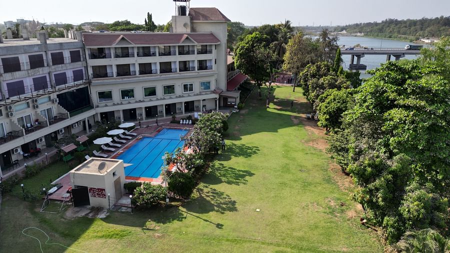 Aerial view of the front lawn of VITS Kamats Resort, Silvassa showcasing the property and the pool