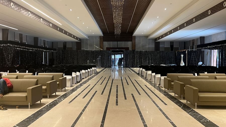 Beautiful wedding stage with floral arch and drape  | VRR Astoria Hotel and Conventional Centre
