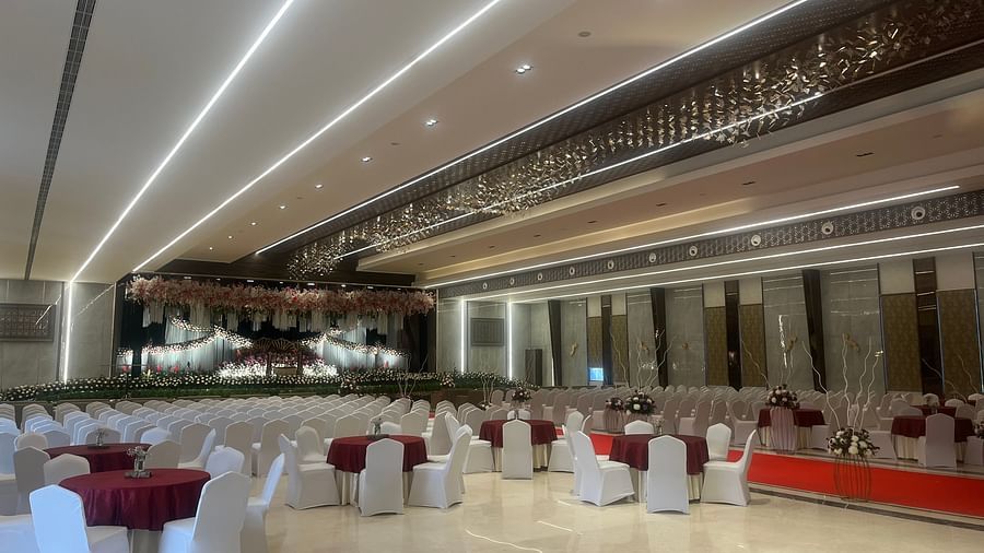 Beautiful wedding stage with floral arch and drape  | VRR Astoria Hotel and Conventional Centre