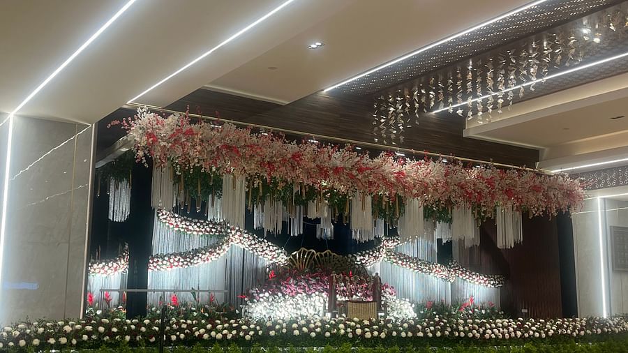 Elegant wedding stage with floral arrangements  | VRR Astoria Hotel and Conventional Centre