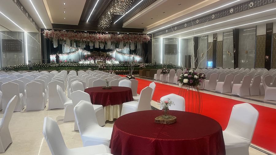 Grand entrance to a banquet hall with red carpet and pillar  | VRR Astoria Hotel and Conventional Centre