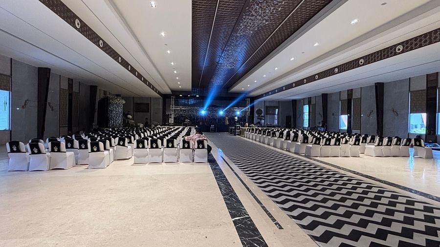 Spacious Banquet Hall with Stylish Flooring and Elegant Lighting