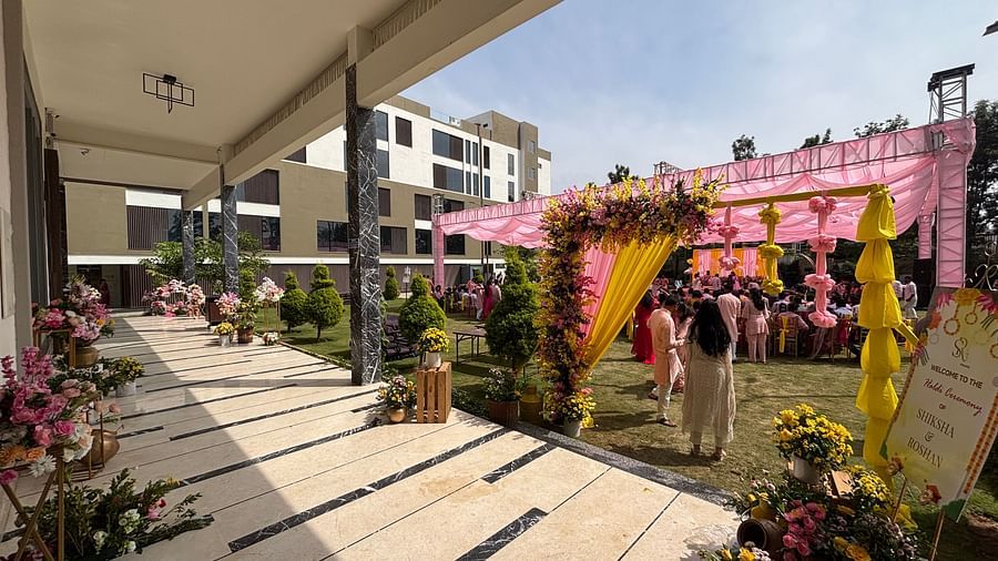Pathway with Themed Wedding Decor and Sculpted Floral Arrangements - VRR Astoria Hotel and Conventional Centre