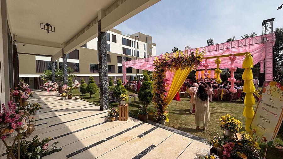 Pathway with Themed Wedding Decor and Sculpted Floral Arrangements - VRR Astoria Hotel and Conventional Centre