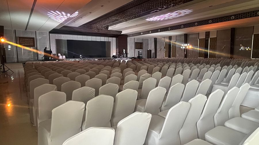 Luxurious wedding stage with floral arrangements and lighting  | VRR Astoria Hotel and Conventional Centre