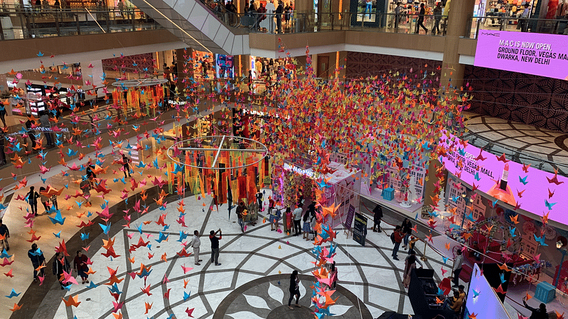 Interior of a shopping mall in Chennai with people walking 