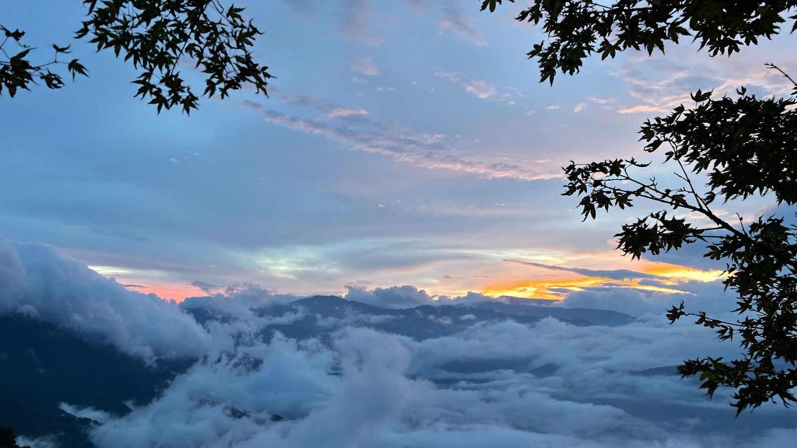 Stunning view of clouds and sunset from Cedar Inn lookout