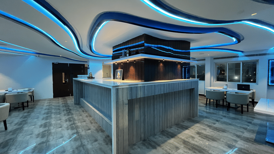 IMG 1644Sleek bar counter with ambient lighting and modern décor at Alps Residency, Krishnagiri.