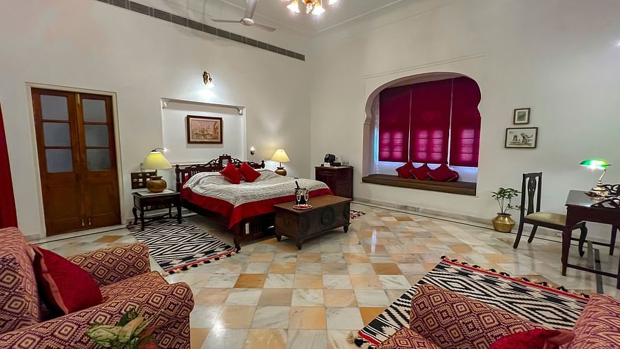 image of the Deluxe suite at Dev Shree, deogarh featuring a double bed in the room