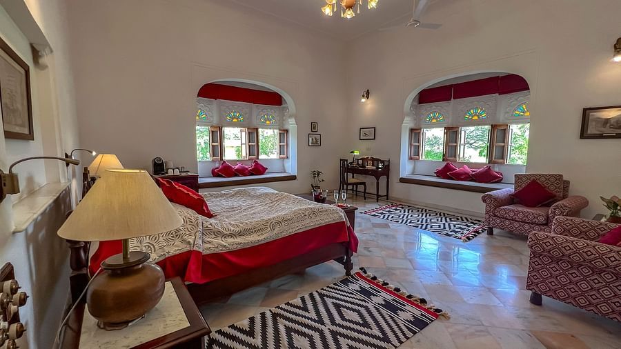 full view image of the Deluxe suite at Dev Shree, deogarh featuring a double bed