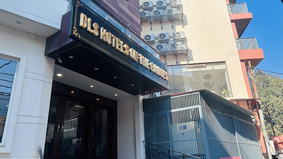 Wide-angle view of the hotel entrance with DLS Hotels on the Ganges sign, steps leading up to the doors, and a clear view of the building’s front, showing the inviting and well-maintained exterior of the property.