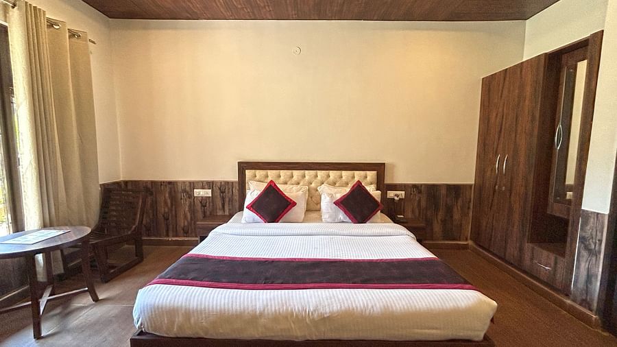 Luxury Cottage with a large bed at DLS MJ River Resort, Rishikesh.