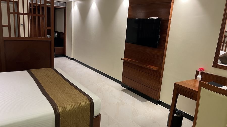 A side angle view of the suite TV and the work desk