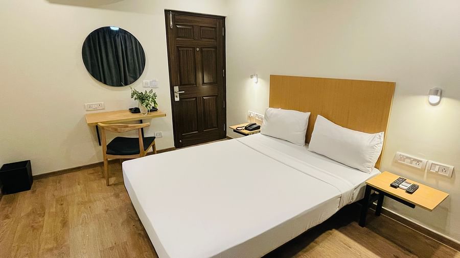 Image of a double bed at Sanctum Suites Richmond Road Bangalore
