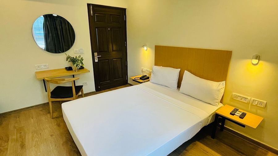 Image of a double bed at Sanctum Suites Richmond Road Bangalore