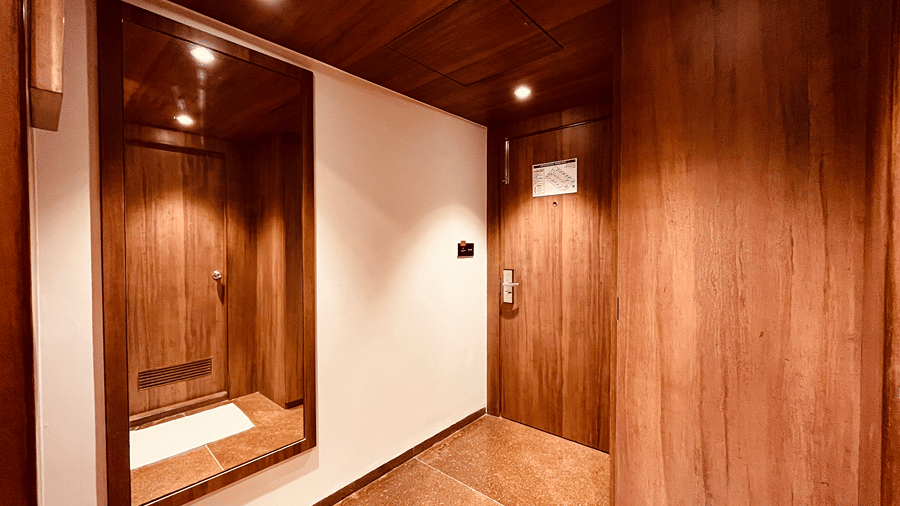 The entrance of the Superior Smart Suite featuring a full length mirror opposite to the wardrobe at the Senses Hotel.