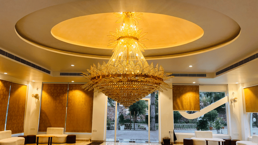 Chandelier above the lobby seating at Valley by Grassfield, a resort in Jaipur.
