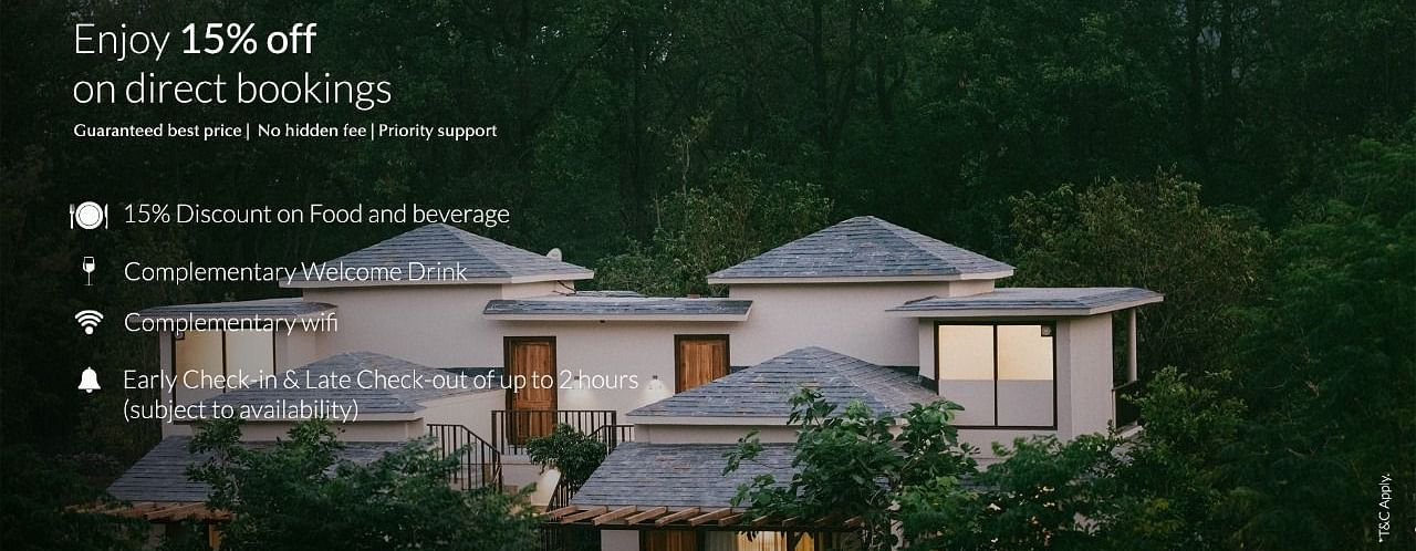 Resort villas with trees, promoting 15% off on direct bookings with added guest benefits.