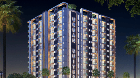 Facade view of Urban Suites by BluSalzz, Jaipur, A Business Hotel in Jaipur, against the night sky, with the building glowing beautifully in the evening light.