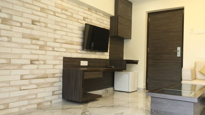 Picture showing the Television and Teapoy in the Friends and Family Pent House Duplex, at ZARA’s Resort, Khandala