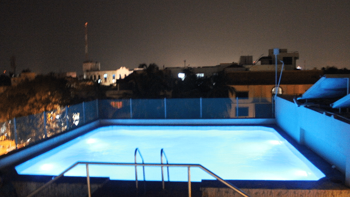 An overview of the swimming pool at Raj Park Hotel,Chennai.