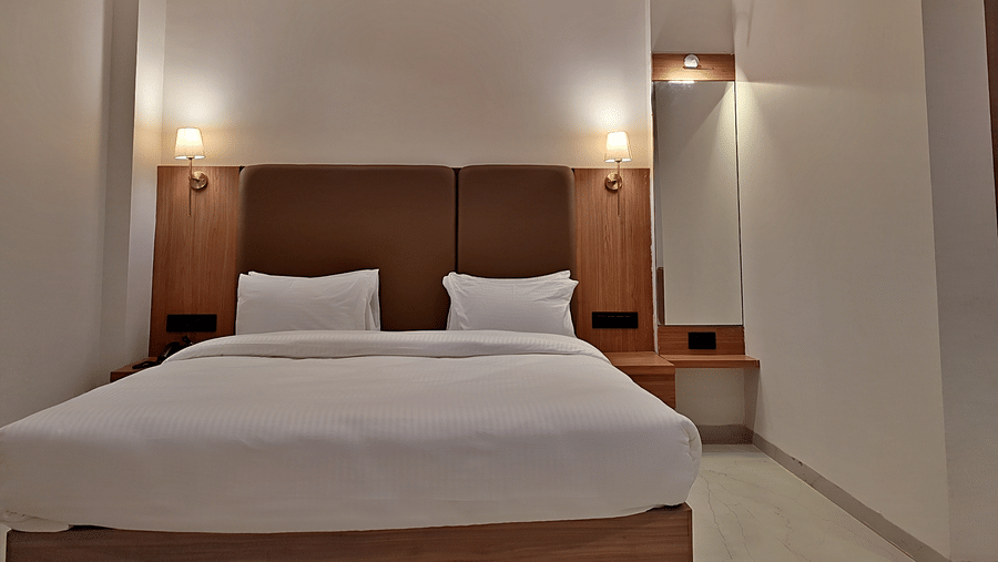 bedroom with modern interior and bright lights.