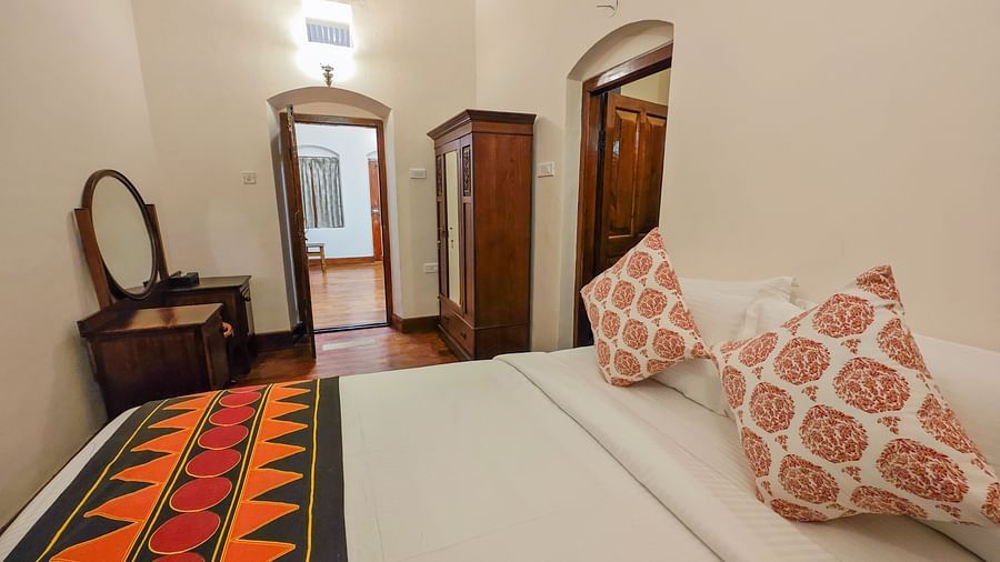 A view of the Mayfair Suite Main Bedroom with adjoining room - Ibex Stays & Trails, Coonoor (Leewood)