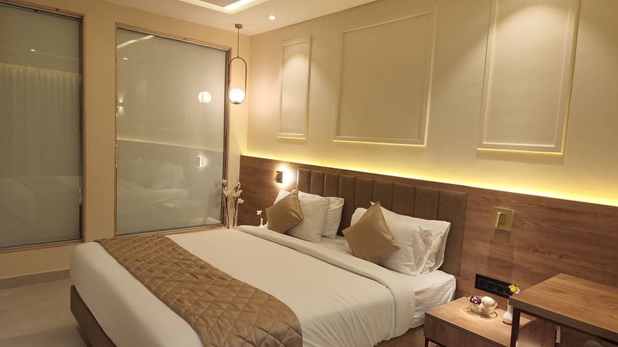 Arabica Suite with a double bed and side tables