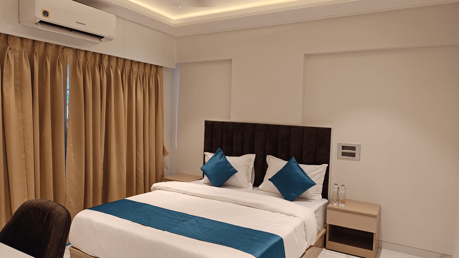 King bedroom in a serviced apartment at Home2 Residency, Mumbai Airport