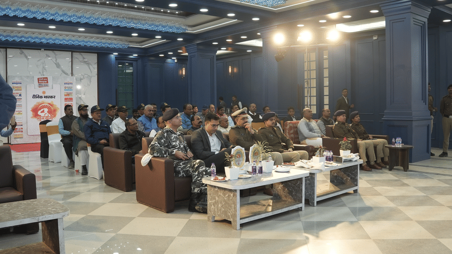 A wide-angle view of the audience and seating arrangement in the grand hall of the Ram Bhawan Ram Yamuna Prasad Hotel and Resort.