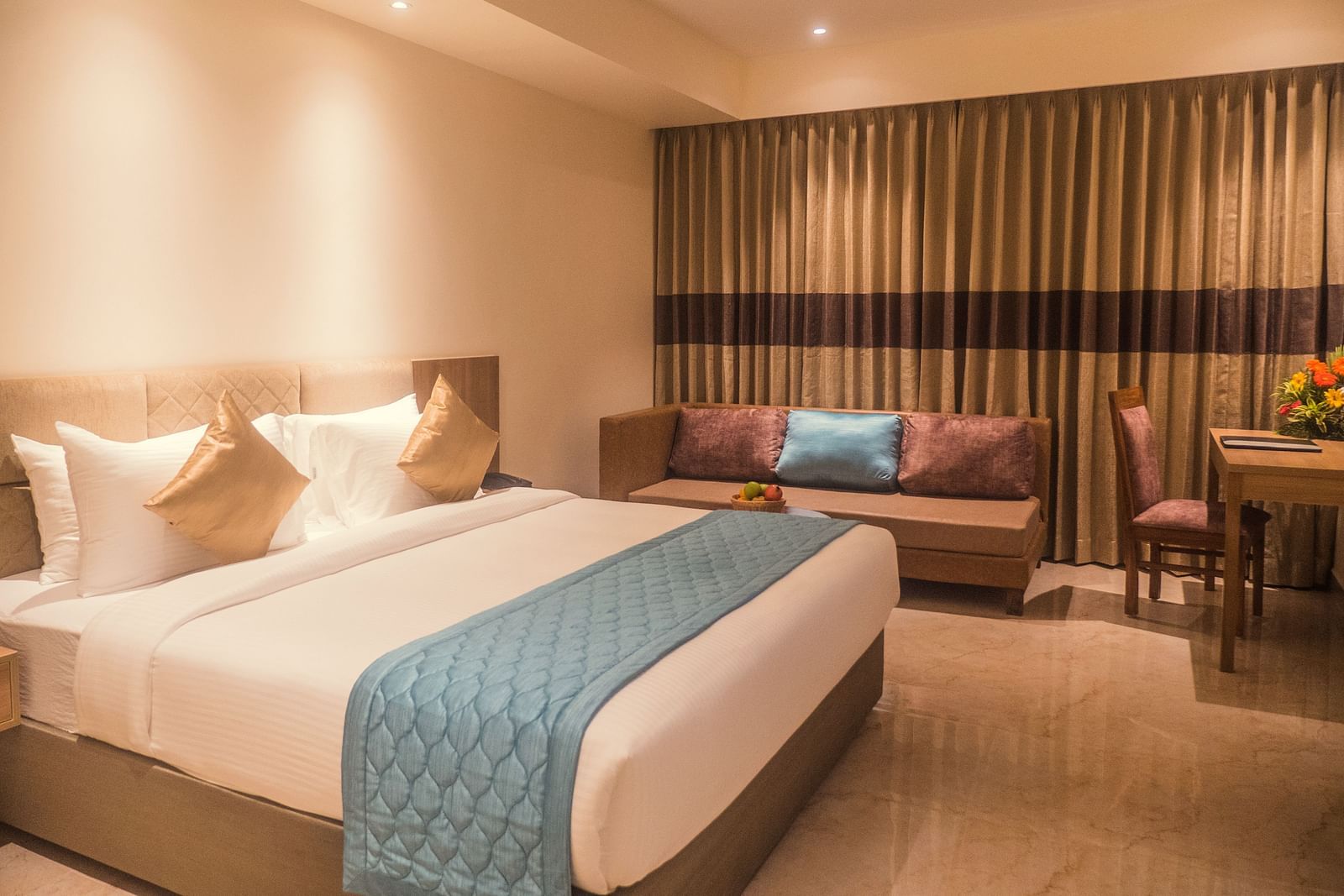 view of a king size bed of a Premium Room 