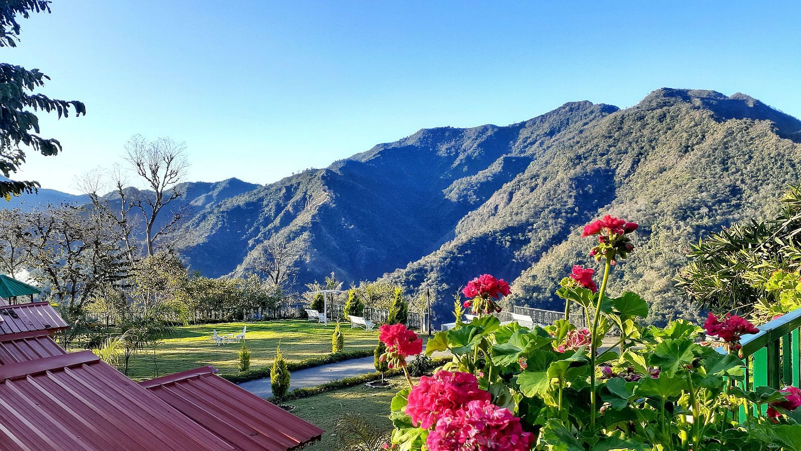 Top view of Neer Ganga Resorts with mountains in the backdrop during daytime
