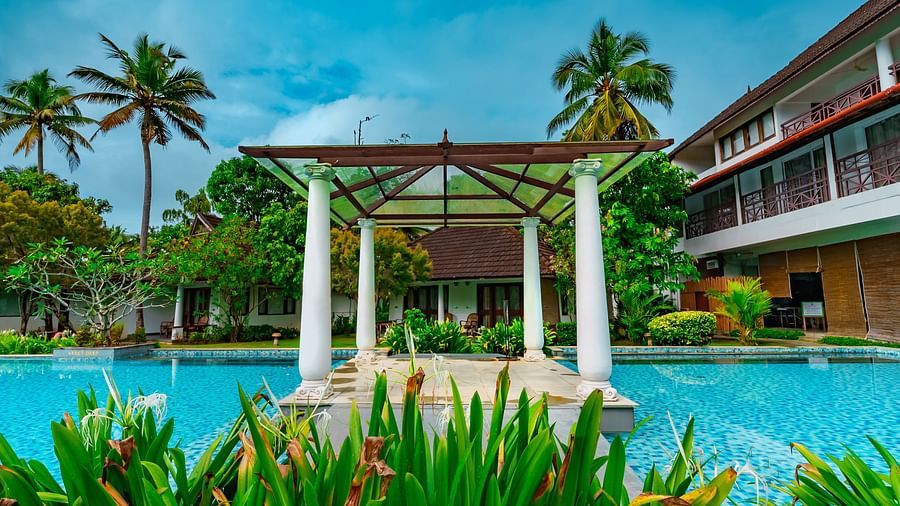 Rhythm Kumarakom - a sitout on the swimming pool
