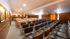 Row-wise seating arrangements with stylish interior design at The Pavilion, Nainital
