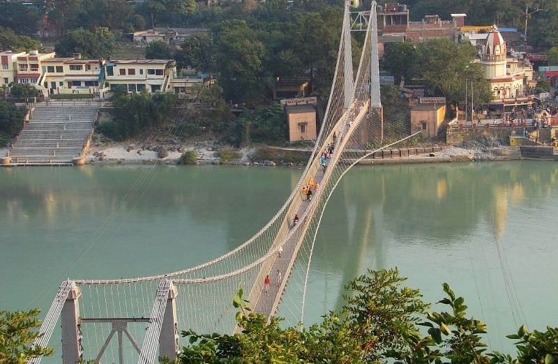 Image of Ram Jhula hanging over a large  water body