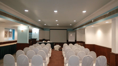 Inner Circle hall with chairs with white lining