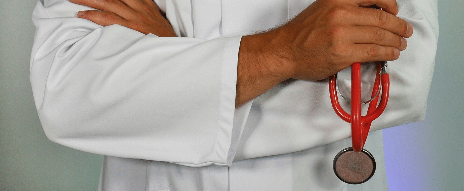 A doctor holding a stethoscope