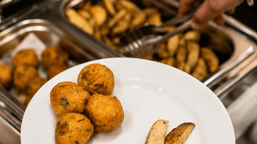 Freshly prepared snacks being served at the buffet at Pride Ashiyana Resort Mussoorie.