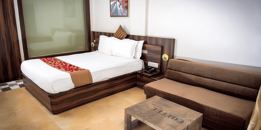 The Regent Room of the resort with its sofa and side table.