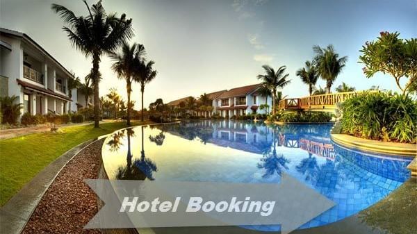 A swimming pool surrounded by buildings and palm trees with the text “Hotel Booking” visible in the image.