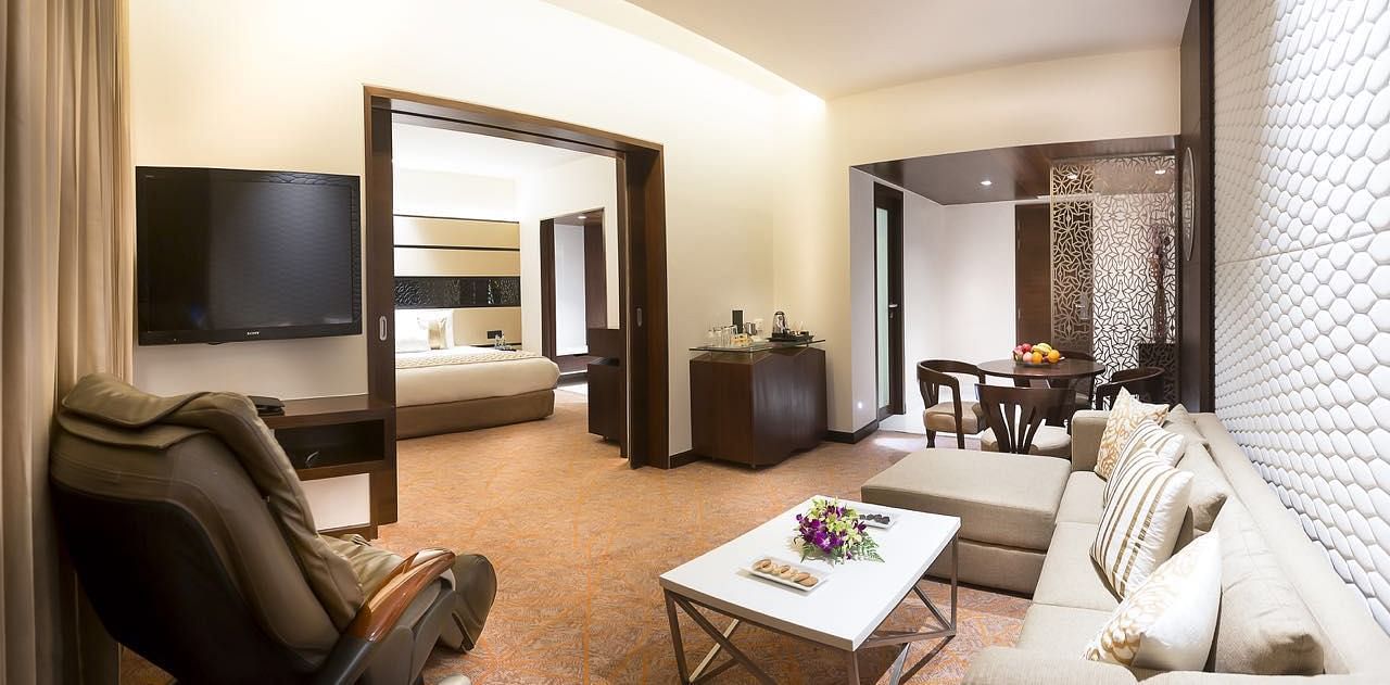 Living room of Theme Suite at Grand Chennai By GRT Hotels.