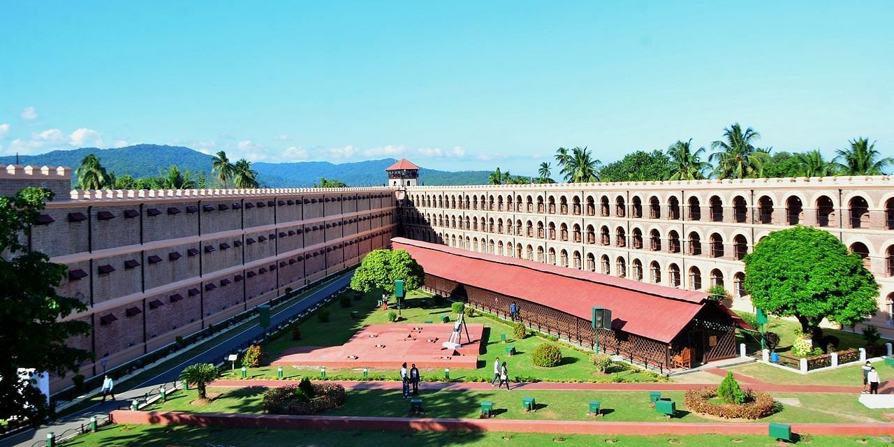 Cellular Jail in Andaman, a historic colonial-era prison with three-winged architecture, lush gardens, and a central watchtower.