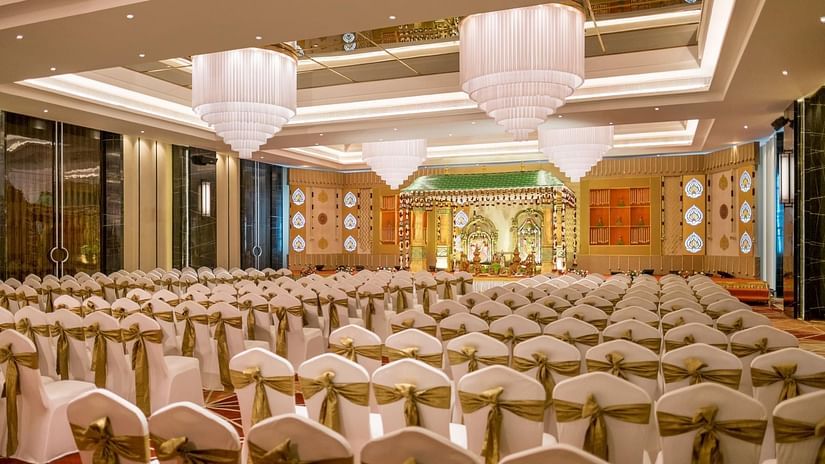 Madappam setup with hanging lights and chair seating at The Residency Towers Coimbatore.