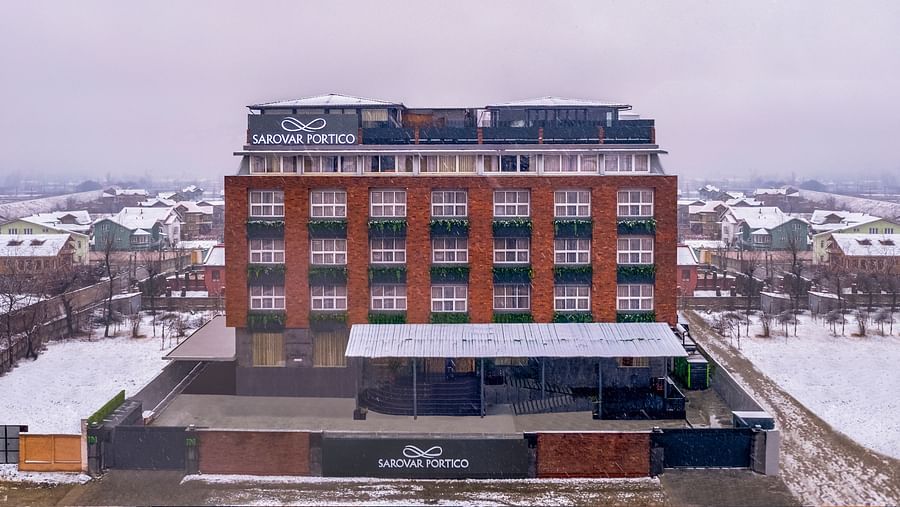 exterior facade of Sarovar Portico Srinagar on a snowy day