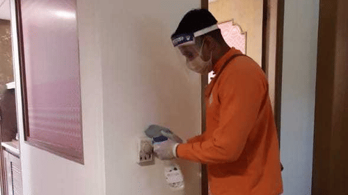 heritage staff santising the resort