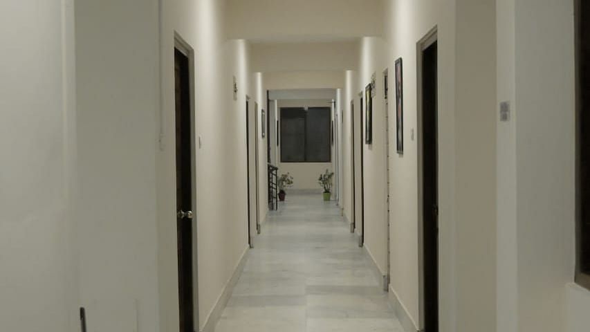 A image of the corridor featuring entrances to different rooms - Sumitel Chiminda, Pelling