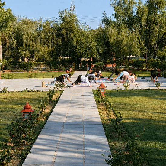 Morning Yoga in the Gardens of Umaid Palace Dausa-Resorts Near Delhi-Coprporate Offsite -Retreats