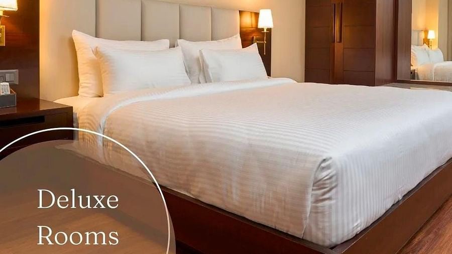 Image of a double bed at Deluxe King room at Visthara - Urban Boutique Hotel, Bangalore