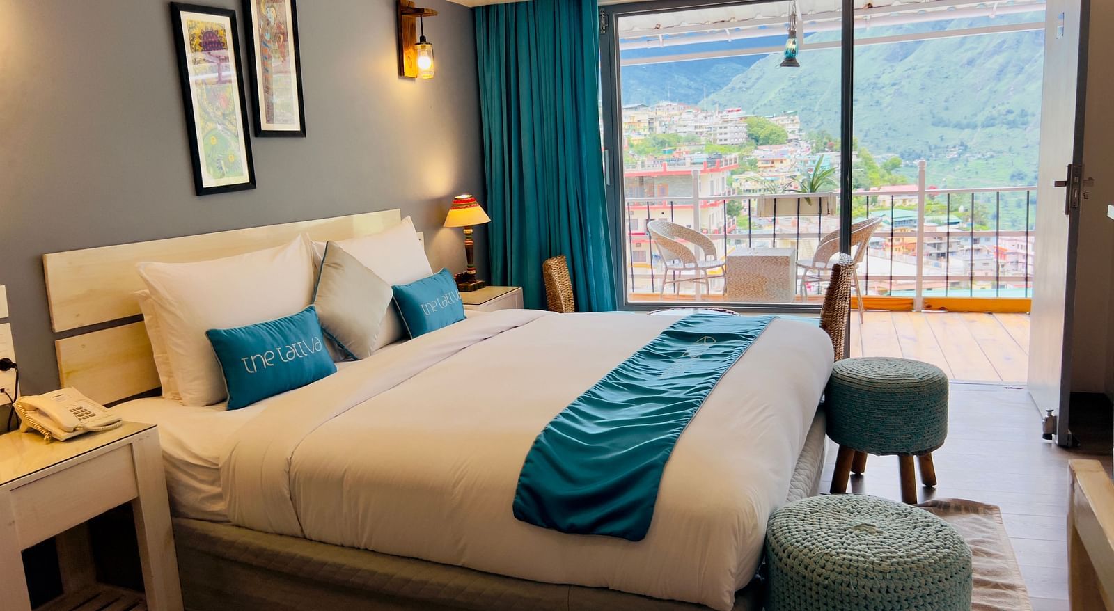 image featuring a plush double bed in the premium room with an amazing valley view - The Tattva Boutique Resort