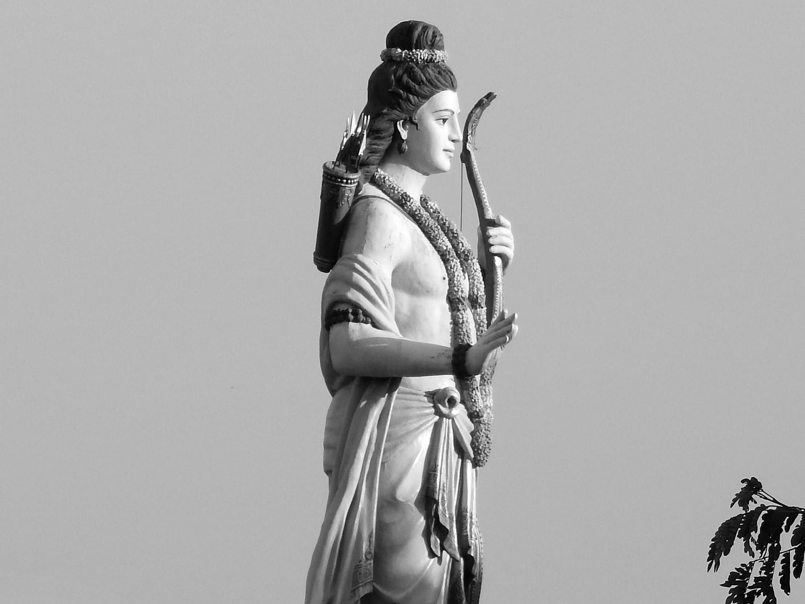 An image of lord rama holding the bow and arrow.